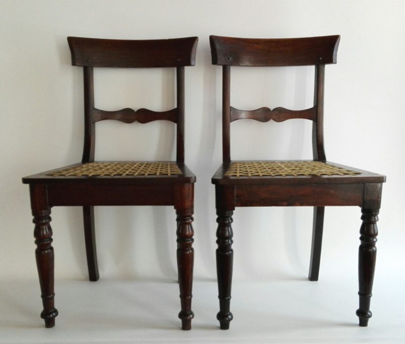 Pair of 19th century stinkwood and riempie Cape regency chairs Lutge
