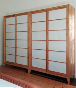 Cupboard with sliding doors created from reclaimed 19th century Oregon pine