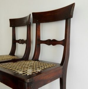 Pair of 19th century stinkwood and riempie Cape regency chairs